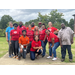 Auburn Housing Authority staff and Target of Opelika Team members pose for a group picture outside 