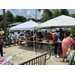 Roanoke community lined up to select items from the Farmers Market display tables.