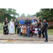 Auburn police and AHA Staff are posed with some youth and families that received supplies at the event today.