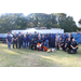 Group of police officers, employees, and Aubie at Operation CommUnity