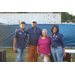 Members of Executive management team and commissioners posing outside at the Operation CommUnity event