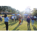 Aubie and residents attending Operation CommUNITY dancing on lawn