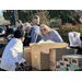 Volunteers interacting with Christmas market attendees.