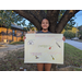 Kyara Copeland holding her winning poster