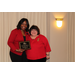 CEO Sharon Tolbert recognized Charlotte Mattox with plaque for her 10 years of service