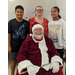 Santa and three kids posing