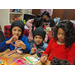 Group of kids working on their Christmas crafts