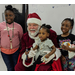 Santa and three little girls 