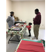 Residents choosing a gift from community table