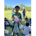 Kid holding a big easter egg