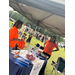  Auburn Housing Authority staff at vendor table talking 