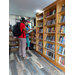  community members at bookshelf 