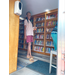  community member at bookshelf  