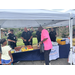  Resident and Auburn Police Department at the Auburn Housing Authority supply table 
