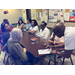  Auburn Housing Authority employees engaged in discussion with CEO Tolbert 