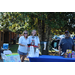  community partners posing with snow cone machine 