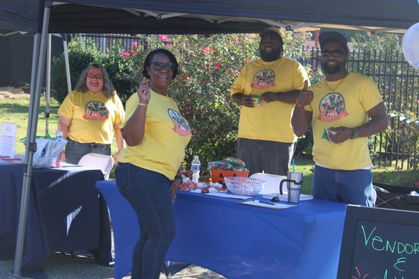ahastaffgettingreadyforfallfestival.jpg aha staff getting setup for fall festival