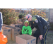  Police officer and little boy standing behind a box 