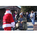  Santa and an elderly lady with a walker  