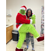  The Grinch hugged up with a female resident 