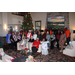  Auburn Housing Authority staff and commissioners at the annual christmas luncheon gathered around the christmas tree 