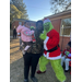  The Grinch with a baby girl and her mother  