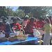  Auburn Housing Authority seniors walking through the food line at the Older Americans Celebration 