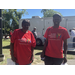  Older american celebration attendees from Auburn Housing Authority posed in their red event shirts 