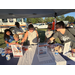  A family visiting the Auburn Housing Authority resource table 