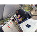  Auburn Police officer providing school supplies to a youth 