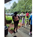 Residents standing in line waiting for the Back to School Supply Giveaway to start 